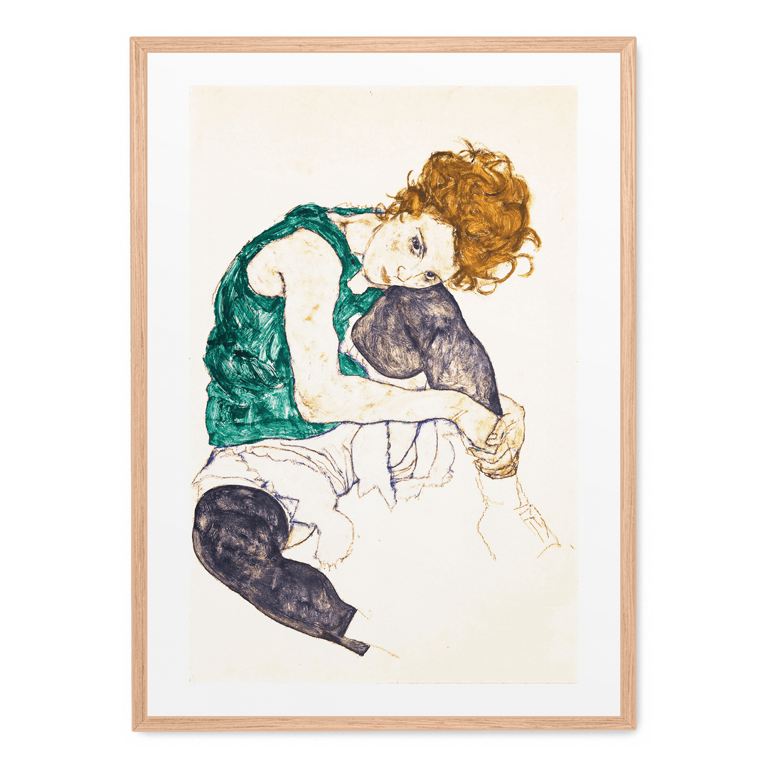 Sitzende Frau Mit Hochgezogenem Knie